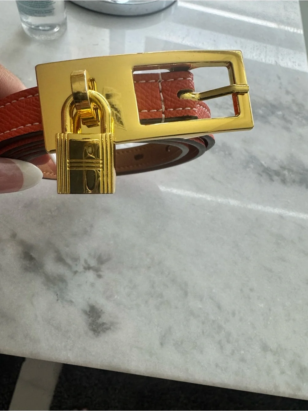 Hermès Orange and gold belt with a classic lock